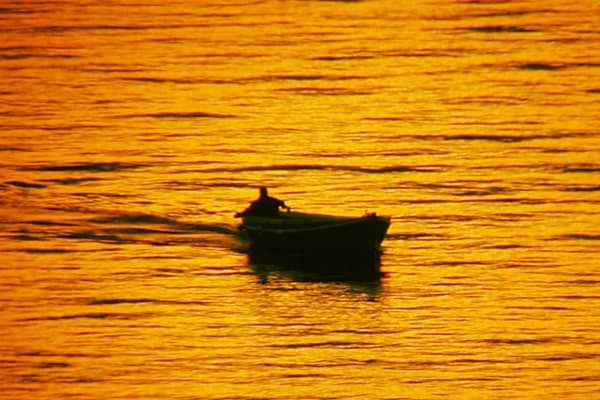 Croatia sunset: Fisherman at sunset