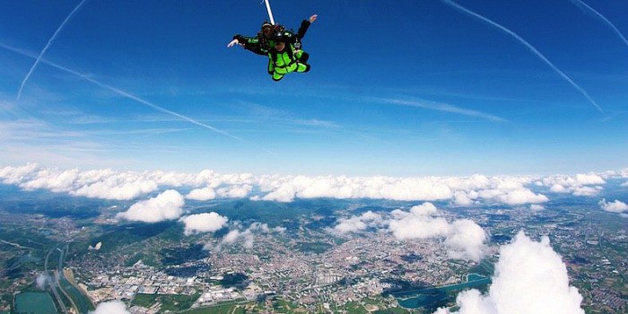 A skydiver in the air above Zagreb