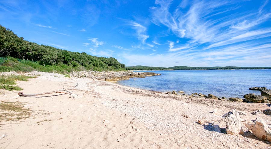 Remote beach in Rovinj near Palud Reserve