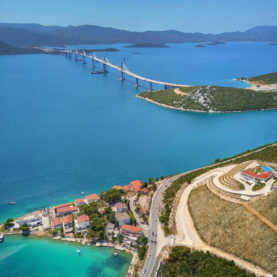 Peljesac Bridge from the air, village of Repic and the sea